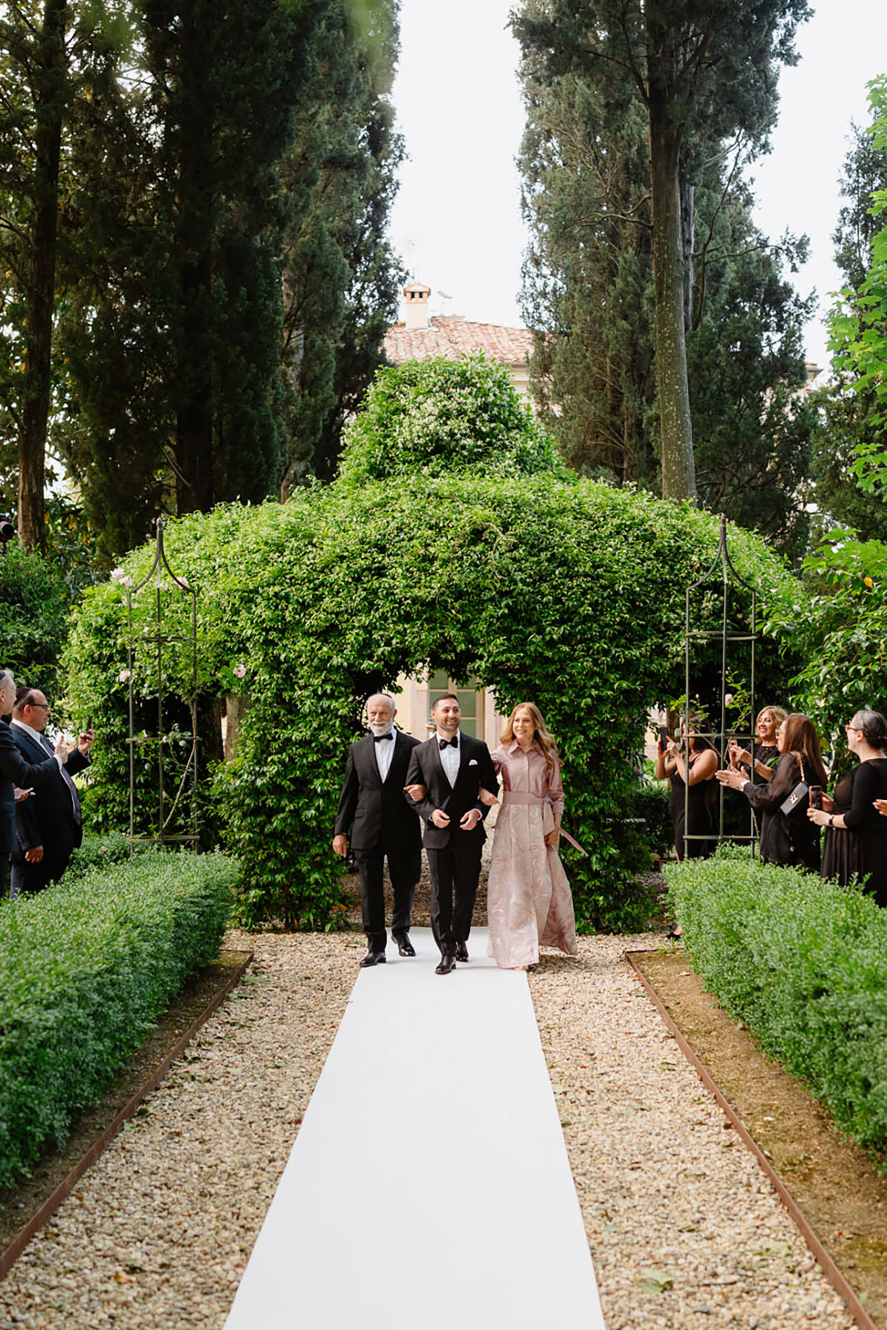 Refeal walking to chuppah with his parents Villa Lenka