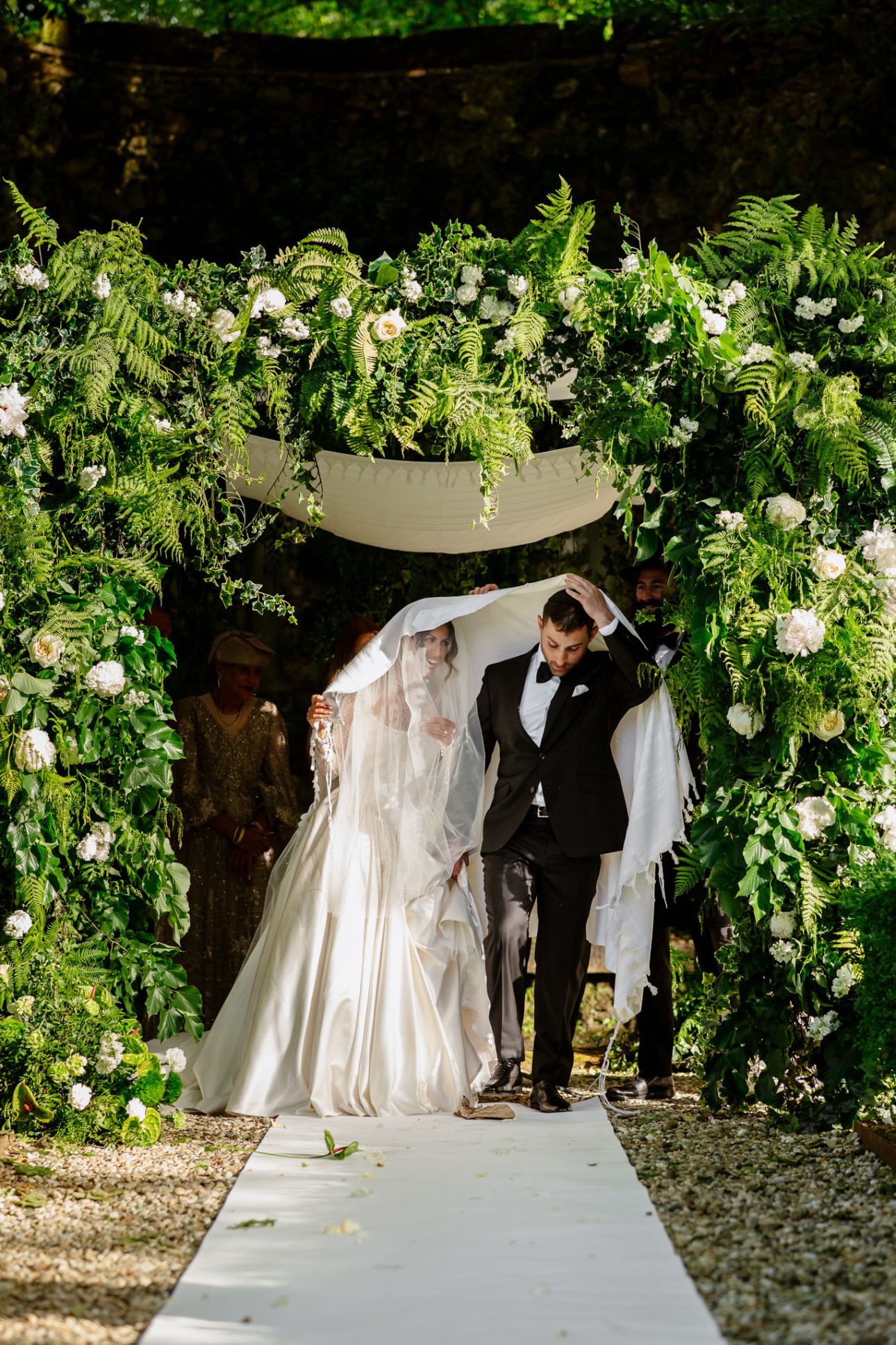 Breaking the glass during jewish wedding in Tuscany